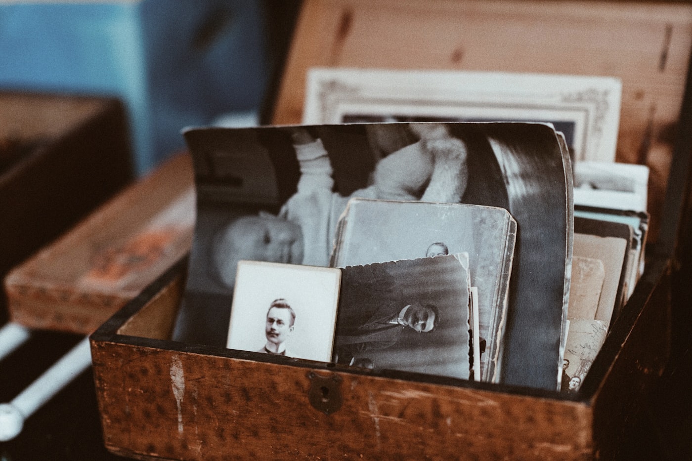 A box of old family photographs to restore