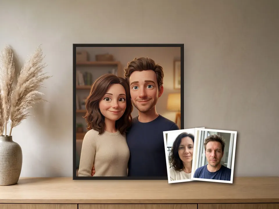 Animation-style portrait of a couple in a black frame on a light oak sideboard, beside a stoneware vase with pampas grass, with the two original photos resting in front